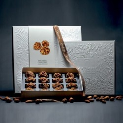 Boite de Rochers aux Eclats de Noisette Fourres Chocolat au Lait et Amandes 150g
